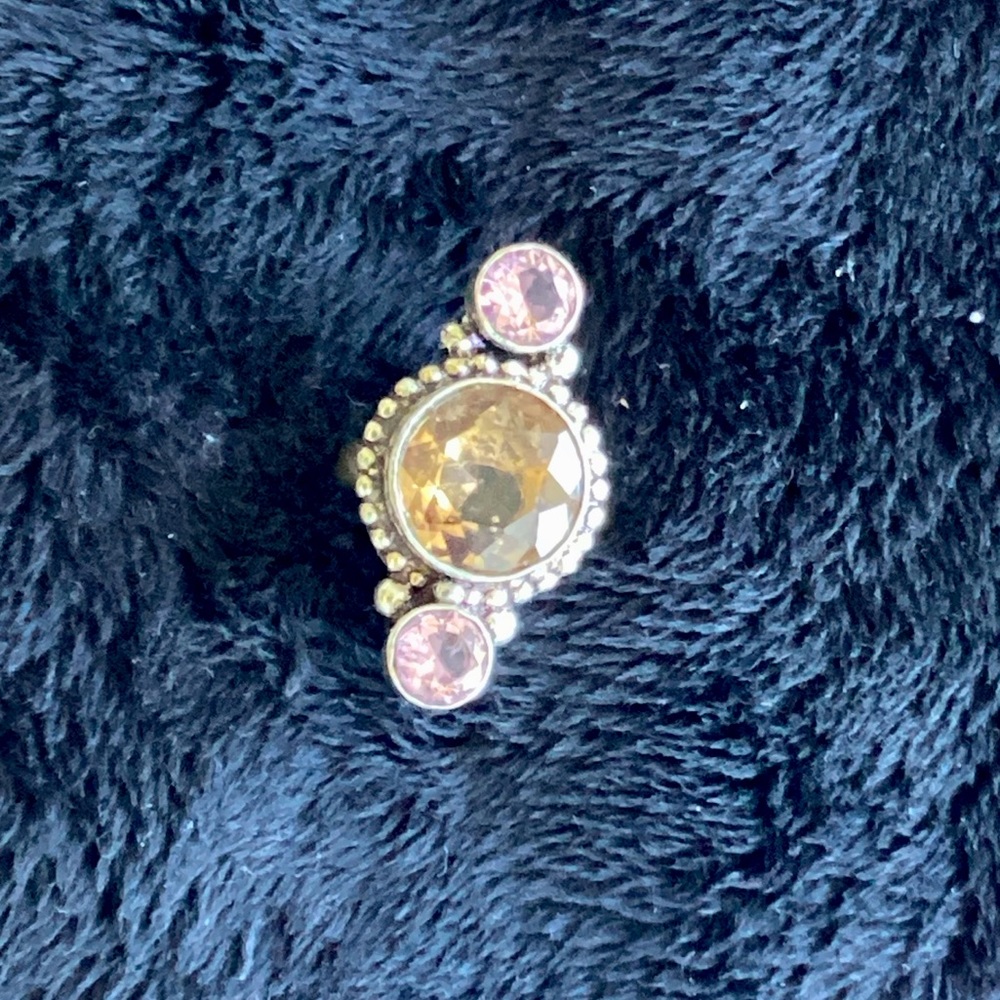 Size 7.25 silver with topaz and amethyst stones